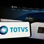 Stuttgart,,Germany,-,05-08-2022:,Person,Holding,Smartphone,With,Logo,Of